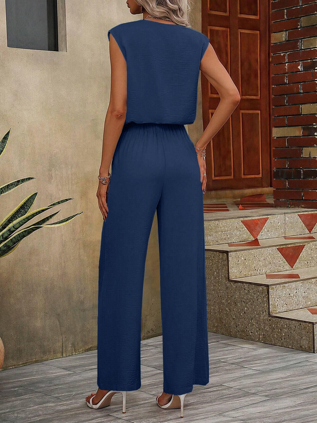 Dame jumpsuit med vidde ben og taljebælte Stilla