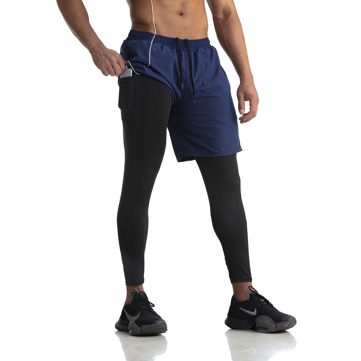 Herrer sportslige løbeshorts med integrerede kompressions leggings Stilla