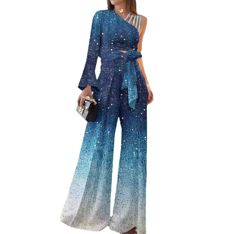 Dame elegant ensidig jumpsuit med glimmerdetaljer og bred ben Stilla