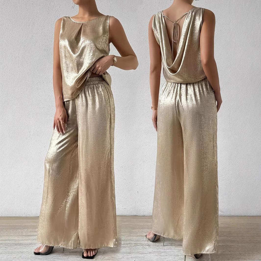 Dame jumpsuit med dyb rygudskæring og flydende silhuet Stilla