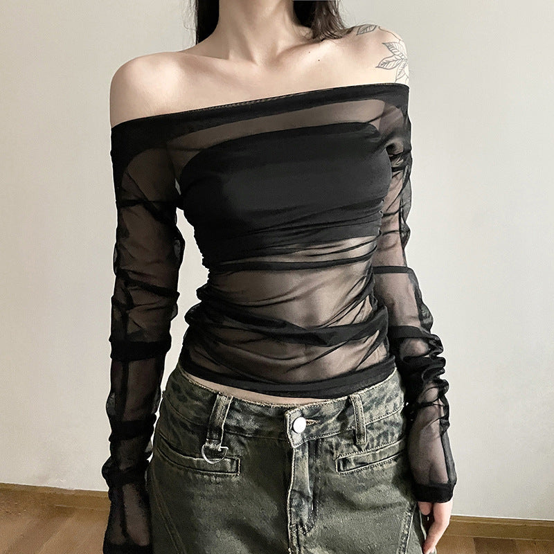 Dame Transparent Bluse med spændende flæse design og elegante ærmer Stilla