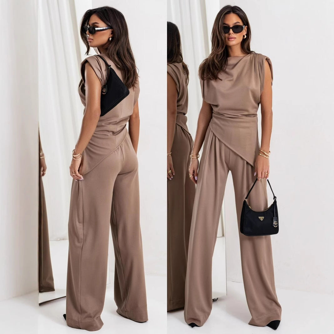 Dame elegant jumpsuit med asymmetrisk snit og flydende design Stilla