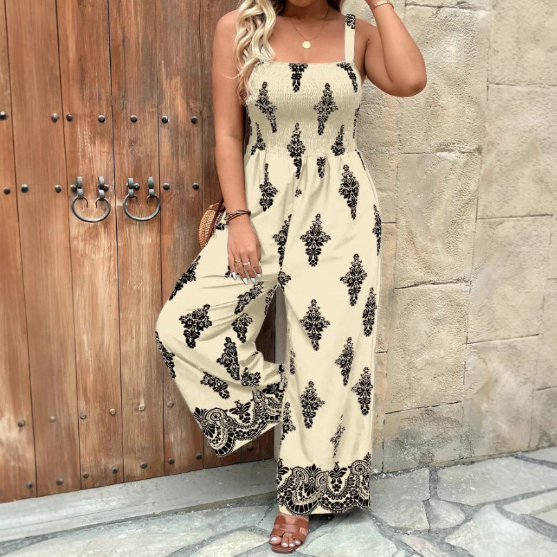 Dame jumpsuit med elegant blomstret design og bredt ben Stilla