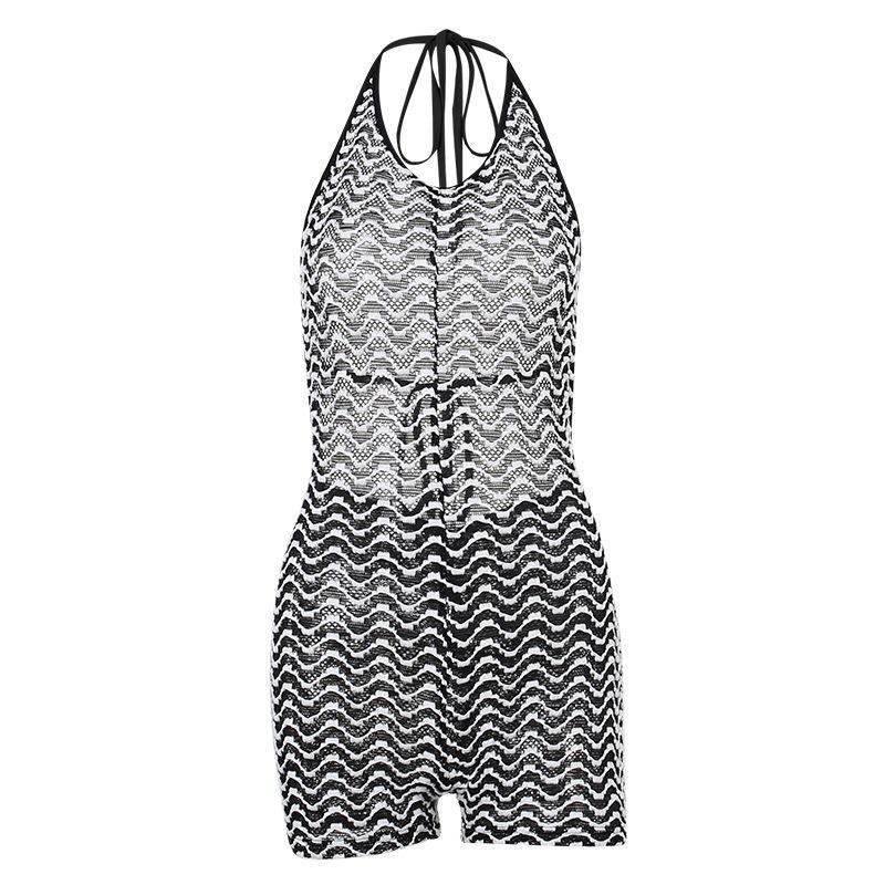 Dame net-jumpsuit med bølgemønster og feminint snit Stilla
