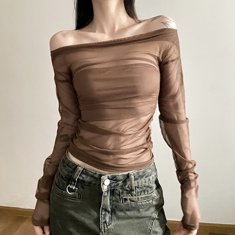 Dame Transparent Bluse med spændende flæse design og elegante ærmer Stilla
