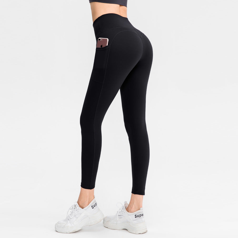 Dame højt skårne fitness leggings med praktiske sidelommer og fleksibelt materiale Stilla