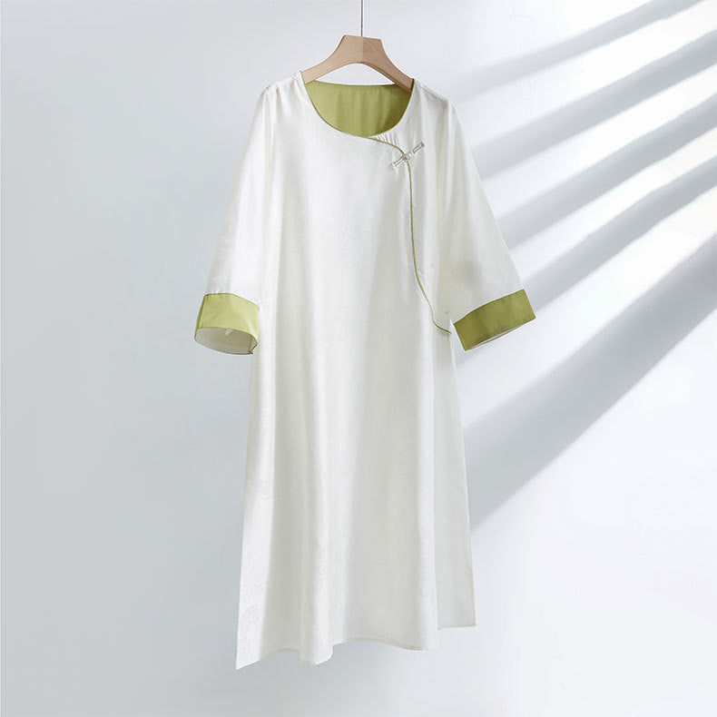 Dame bluse top med blomstret relief og elegant knaplukning Stilla