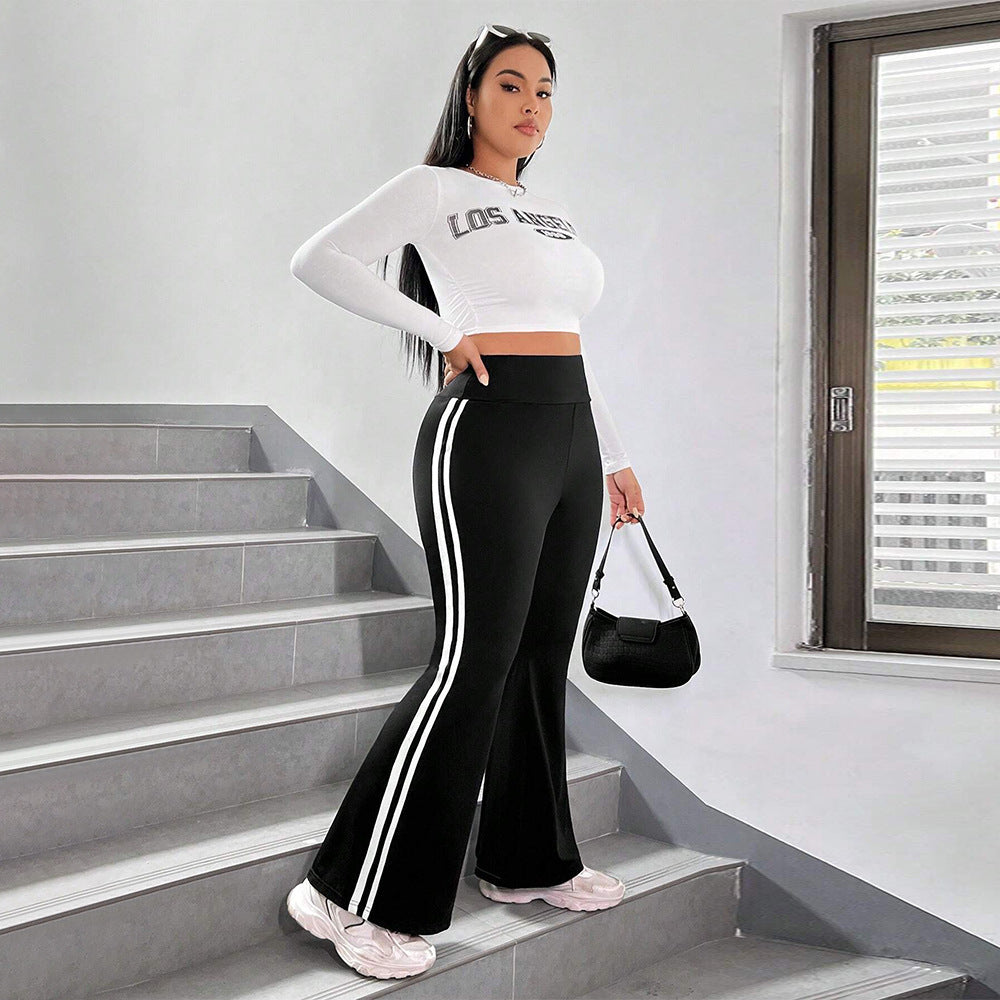 Damer Sporty Flared Leggings med elastisk talje og sidelange striber Stilla