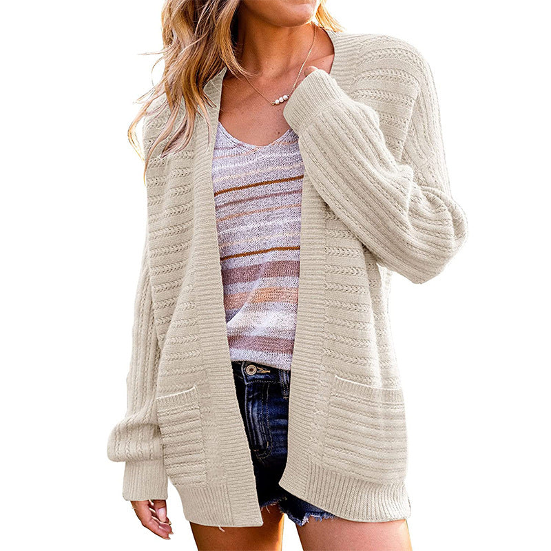 Dame strik cardigan med struktureret design og praktiske lommer Stilla