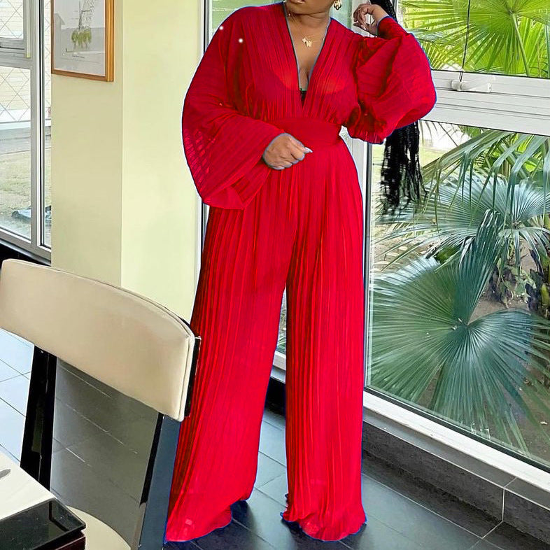 Dame Plisseret Jumpsuit med højtstående udskæring og ballonærmer Stilla