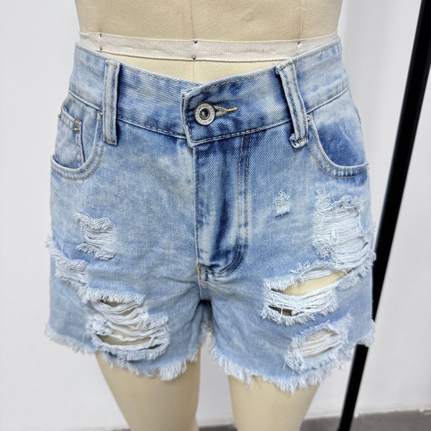 Dame Revnet Denim-Shorts med høj talje og afslappet kant Stilla