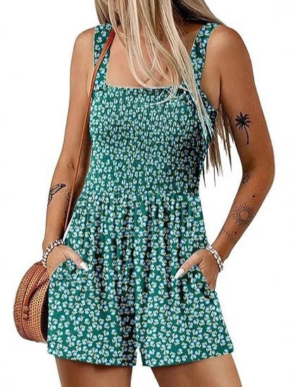 Dame jumpsuit med blomster mønster og praktiske lommer Stilla