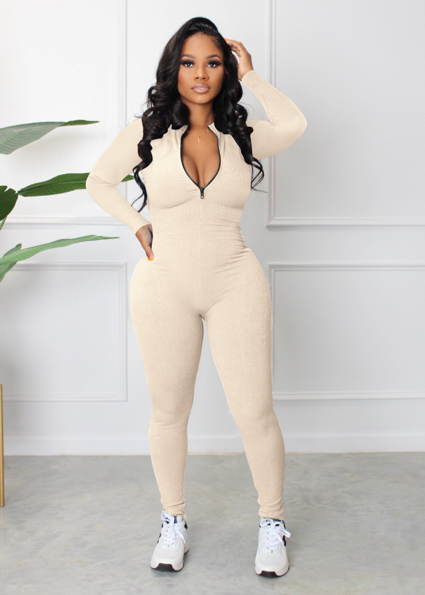Dame sporty langærmet jumpsuit med lynlås og tætsiddende snit Stilla