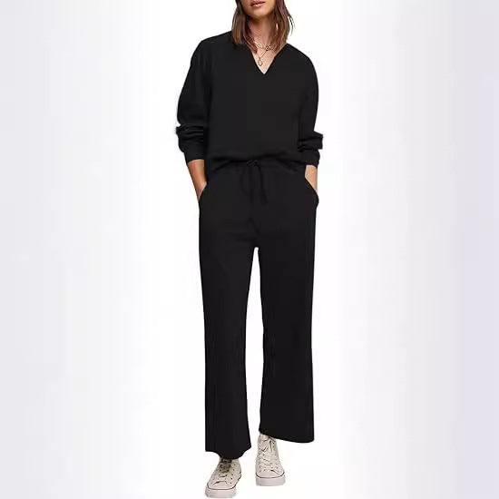 Damer komfortabel V-udskæring jumpsuit med bredt ben og elastisk talje Stilla