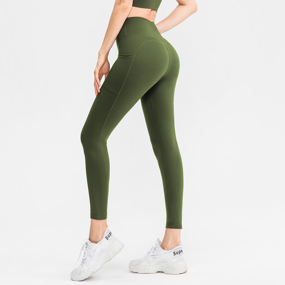 Dame højt skårne fitness leggings med praktiske sidelommer og fleksibelt materiale Stilla