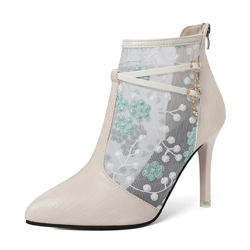Dame elegante ankelstøvler med blomstertransparentdesign og moderigtigt detalje Stilla