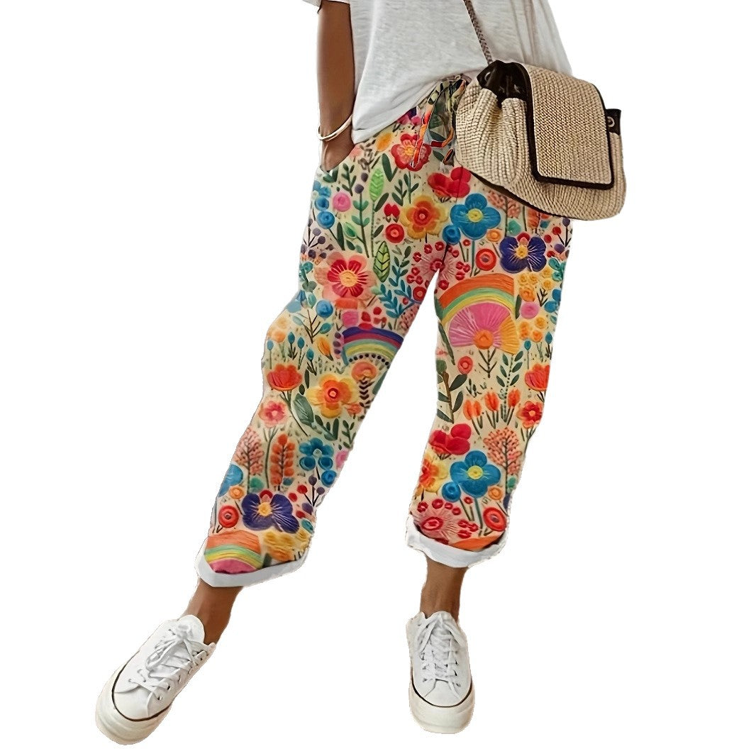 Dame dagbukser med farverige blomstermotiver og løs pasform Stilla