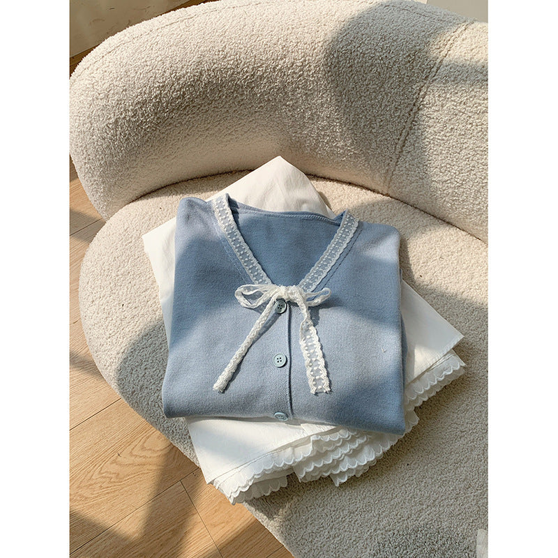 Dame afslappet cardigan med fin ribstrik og dekorativ snorebinding Stilla