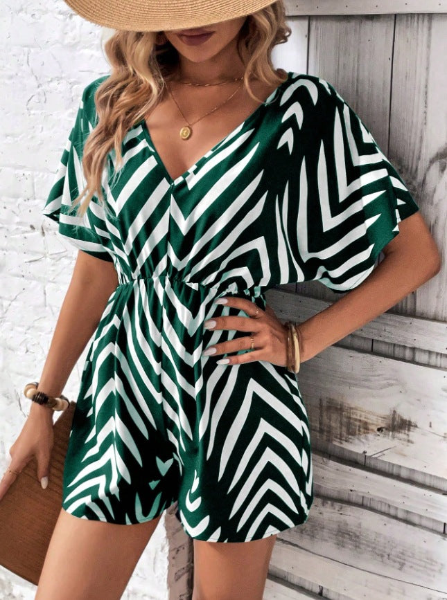 Dame moderigtig jumpsuit med omfattende indpakningslook og grafisk mønster Stilla