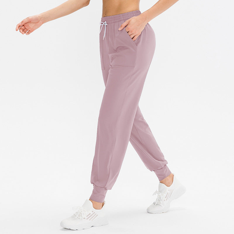 Dame Sporty Joggingbukser med praktiske lynlåslommer og fleksibel talje Stilla