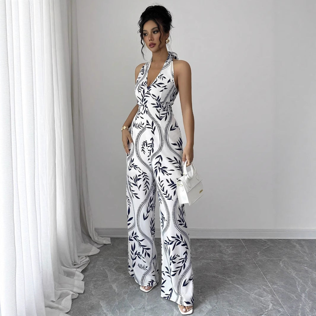 Dame jumpsuit med blomsterprint og smart V-hals Stilla