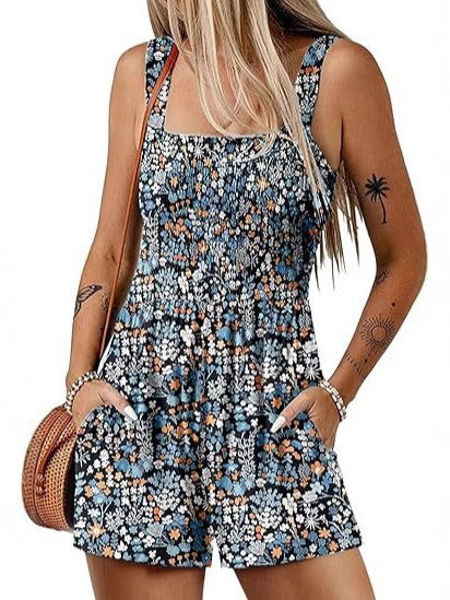 Dame jumpsuit med blomster mønster og praktiske lommer Stilla