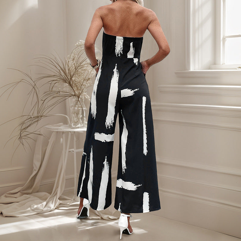 Dame stropløs jumpsuit med bred ben og figursyet bælte Stilla