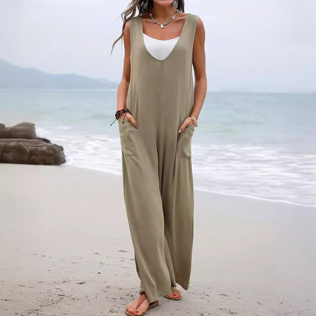 Dame afslappet jumpsuit med dyb V-hals og praktiske lommer Stilla