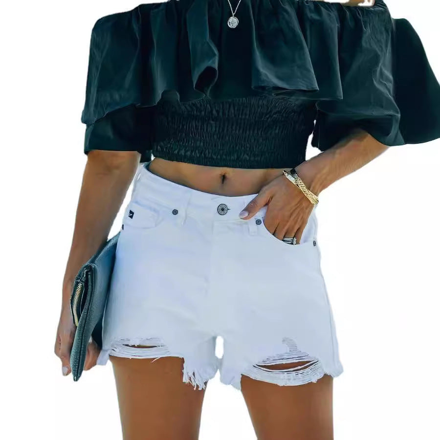 Dame denim-shorts i afslappet destroyed stil med frynset kant Stilla