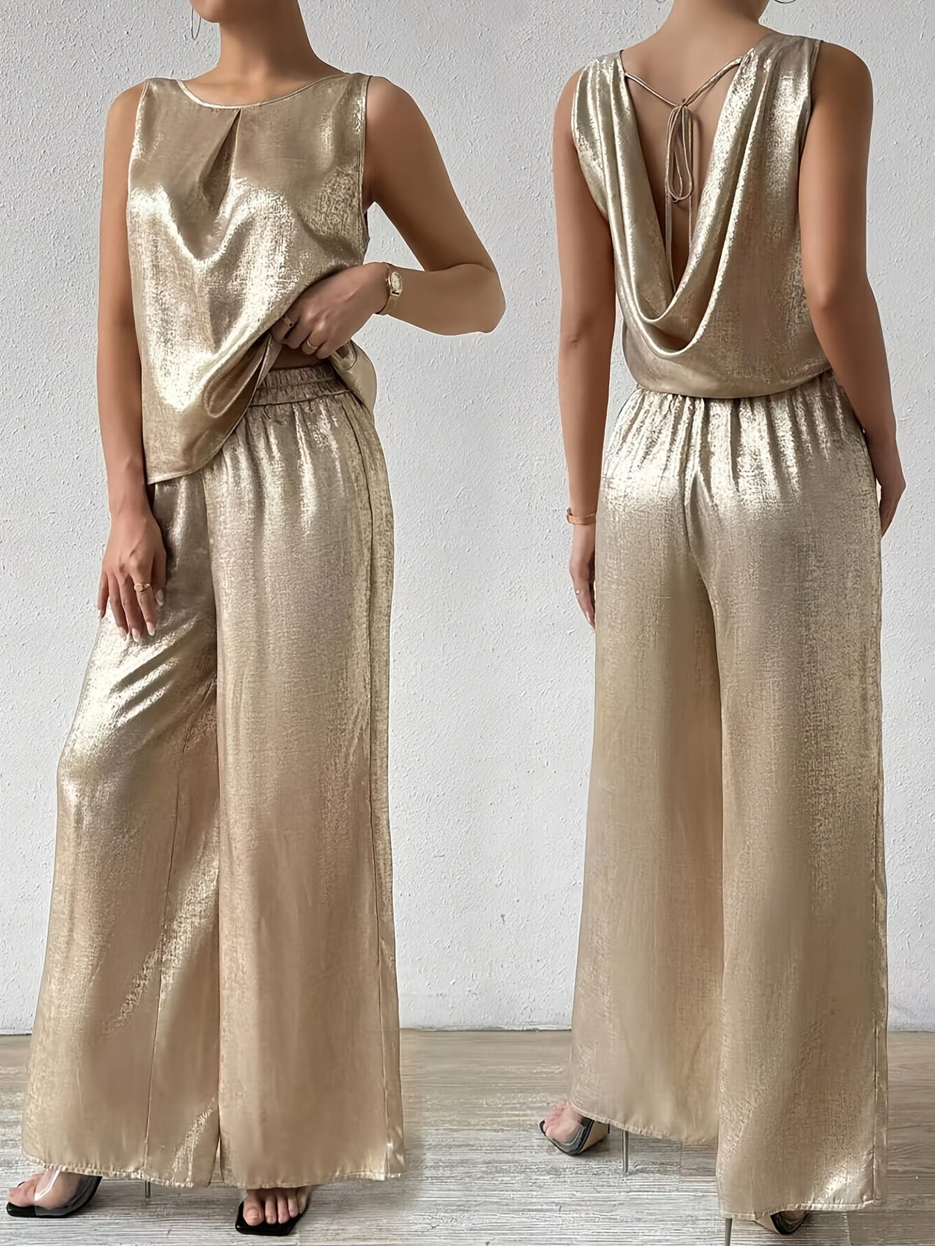 Dame jumpsuit med dyb rygudskæring og flydende silhuet Stilla