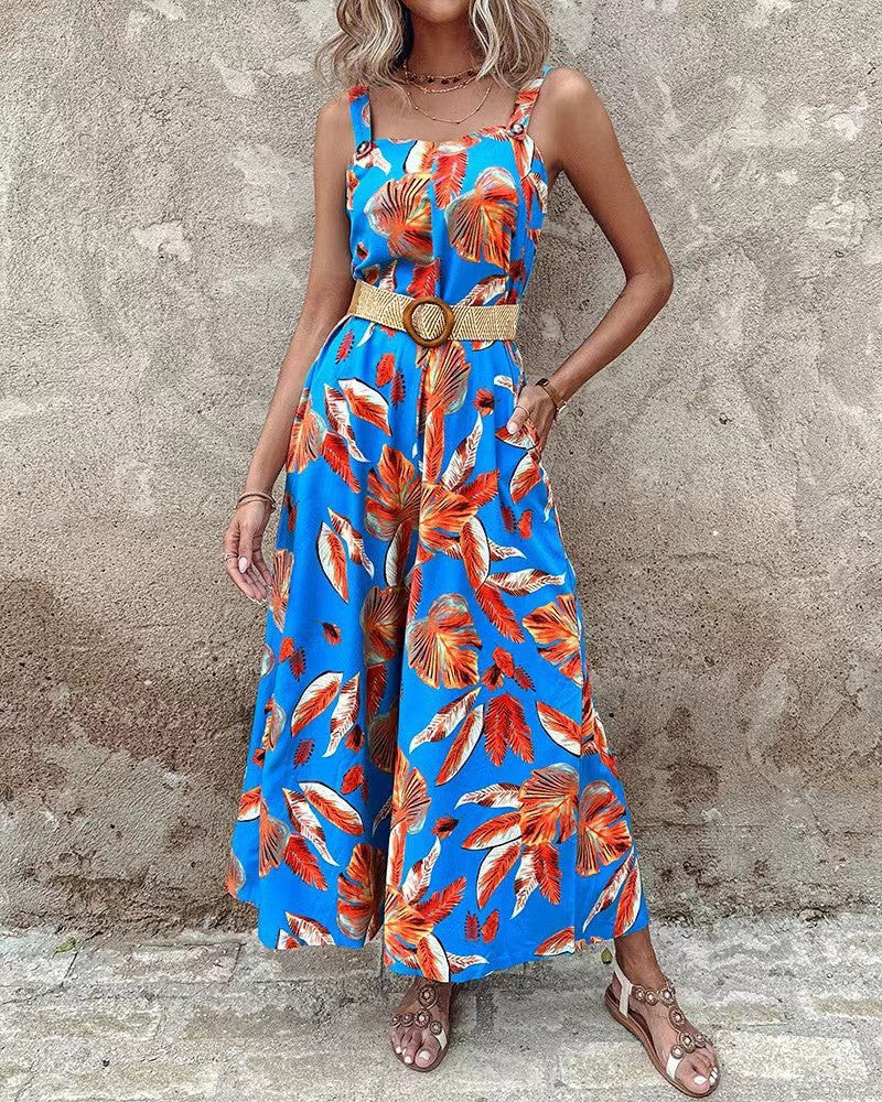 Dame jumpsuit med floral design og tætsiddende bælte Stilla