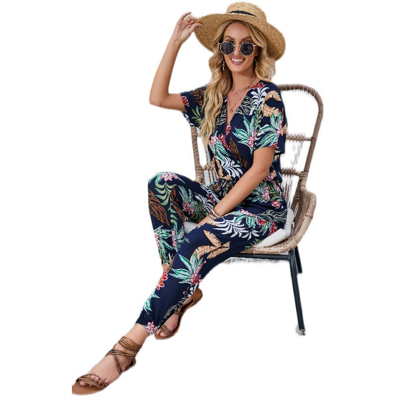 Dame afslappet jumpsuit med blomstret design og elastisk taljejustering Stilla