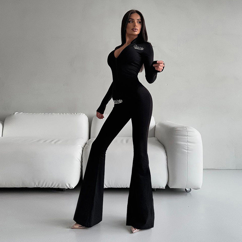 Dame jumpsuit i sporty look med hætte og vidde ben Stilla