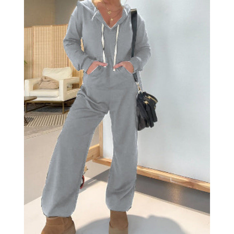 Dame hyggelig hættejumpsuit med løs pasform og praktiske lommer Stilla