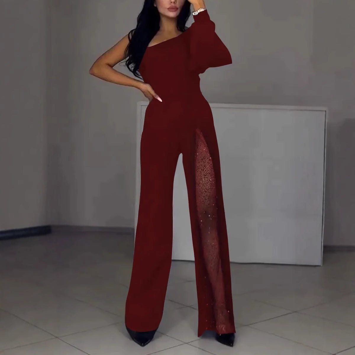 Dame elegant jumpsuit med gennemsigtig side og funkende detaljer Stiila