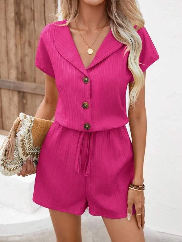 Dame jumpsuit med elegant snit og modiske knapdetaljer Stilla