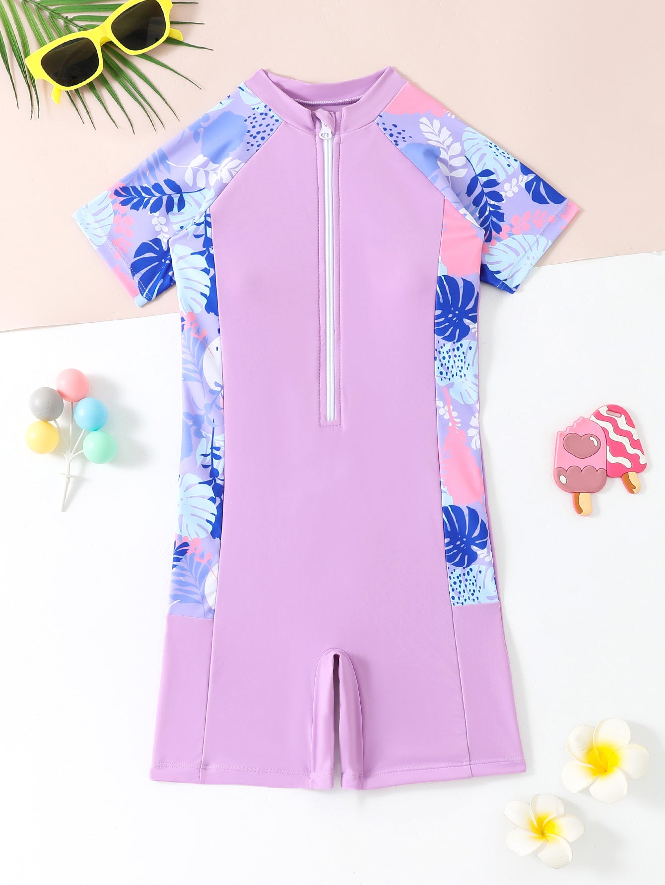 Børne svømmedragt med UV-beskyttelse og blomsterdesign Stilla