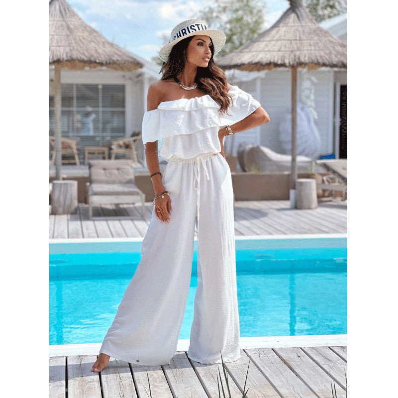 Dame elegant jumpsuit med off-shoulder udskæring og flydende snit Stilla