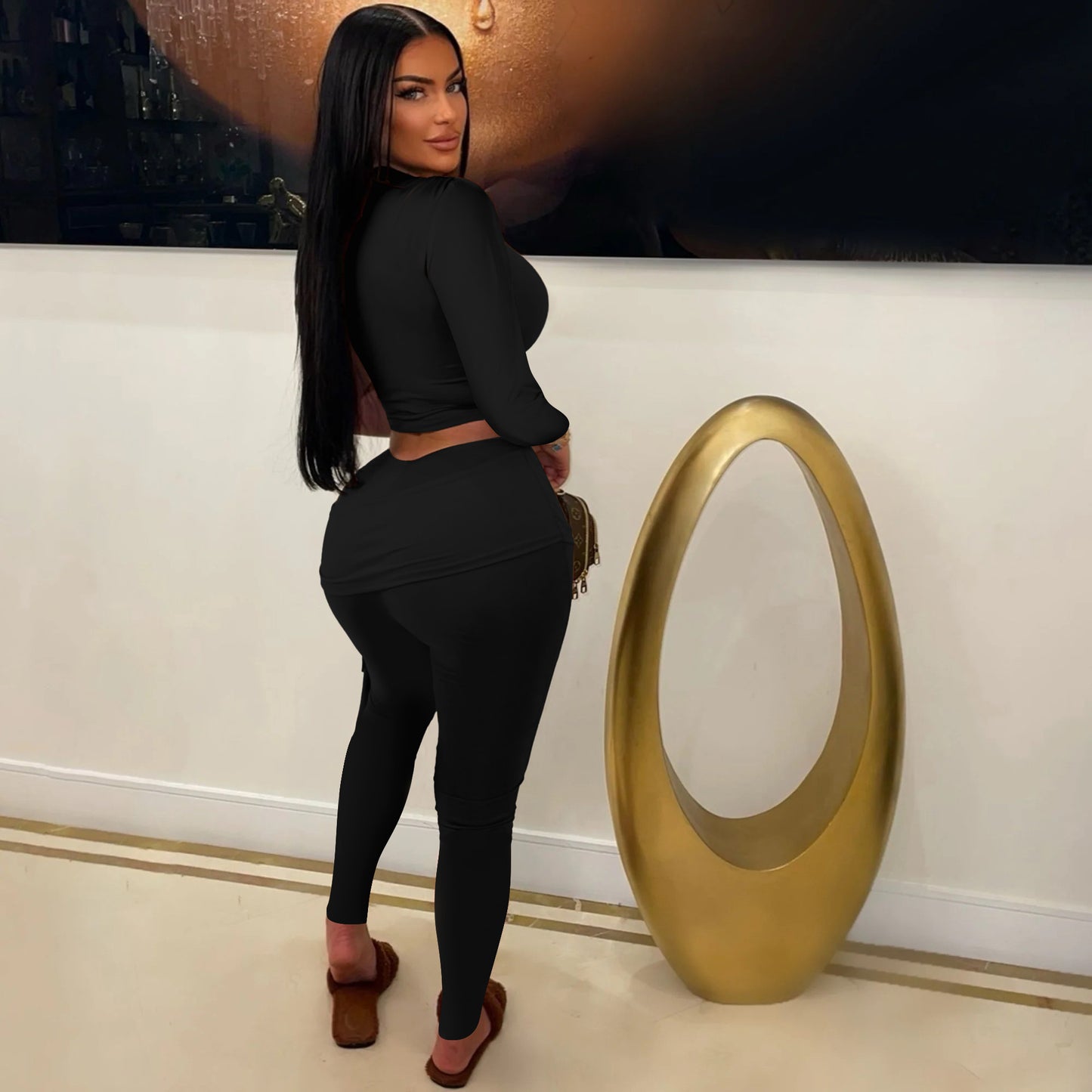 Dame sportsligt lounge-sæt med asymmetrisk top og tætsiddende leggings Stilla