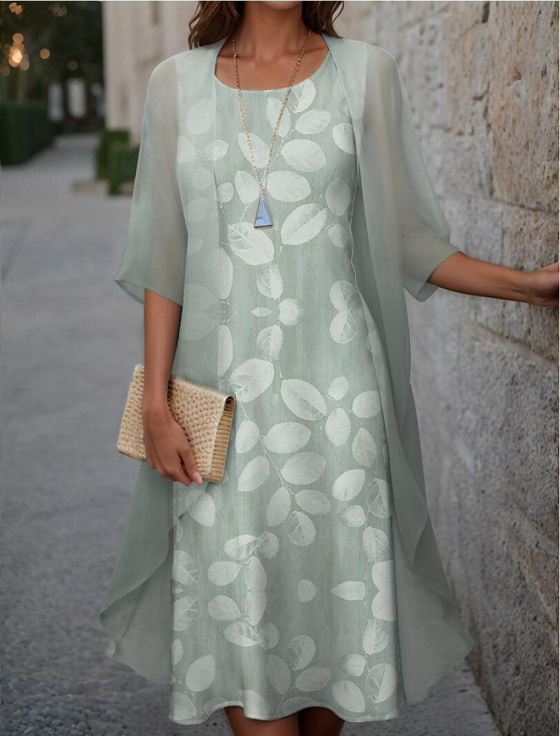 Dame elegant fritidskjole med asymmetrisk kant og floral design Stilla