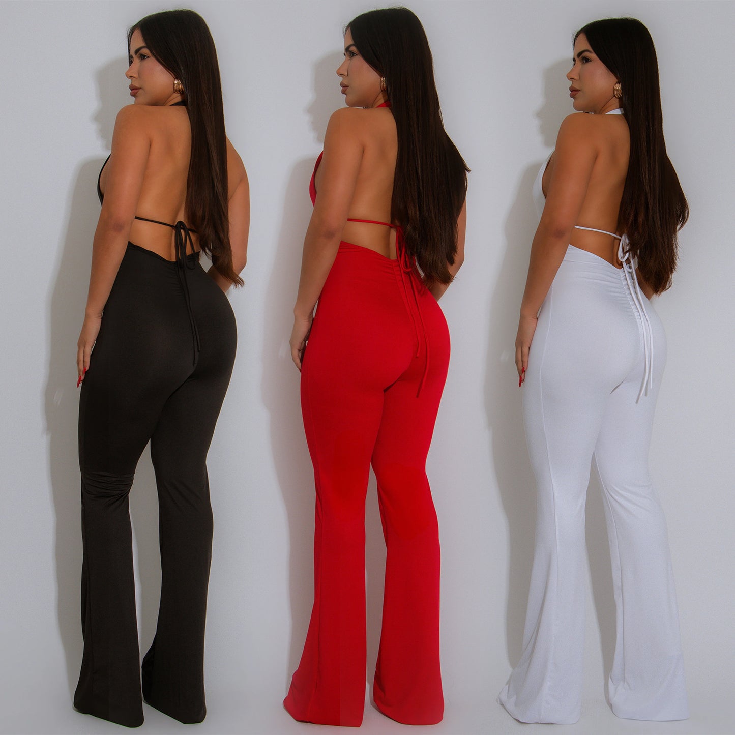 Dame Elegant Flydende Jumpsuit med dyb V-udskæring og tætsiddende silhuet Stilla