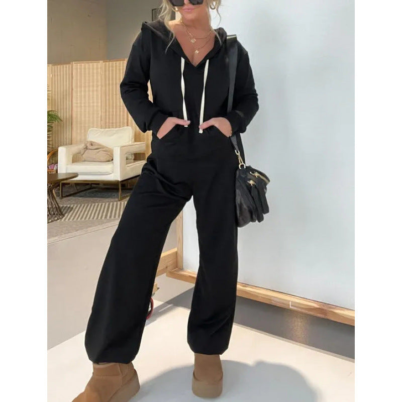 Dame hyggelig hættejumpsuit med løs pasform og praktiske lommer Stilla
