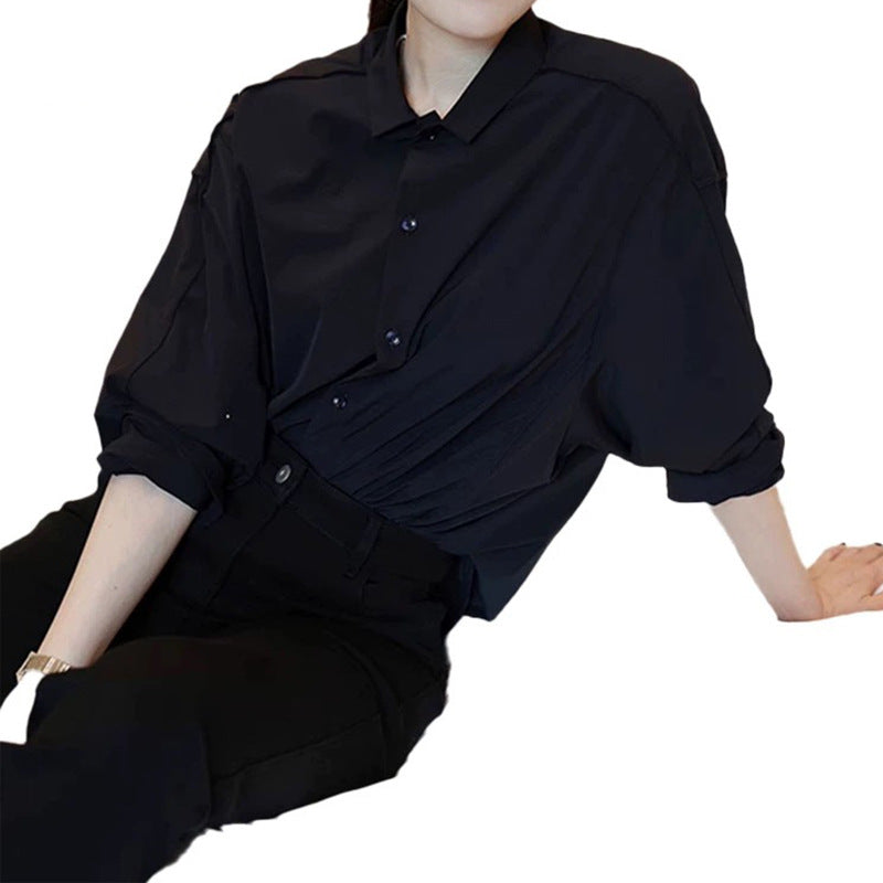 Dame afslappet bluse med ballonformet snit og elegant knaplukning Stilla