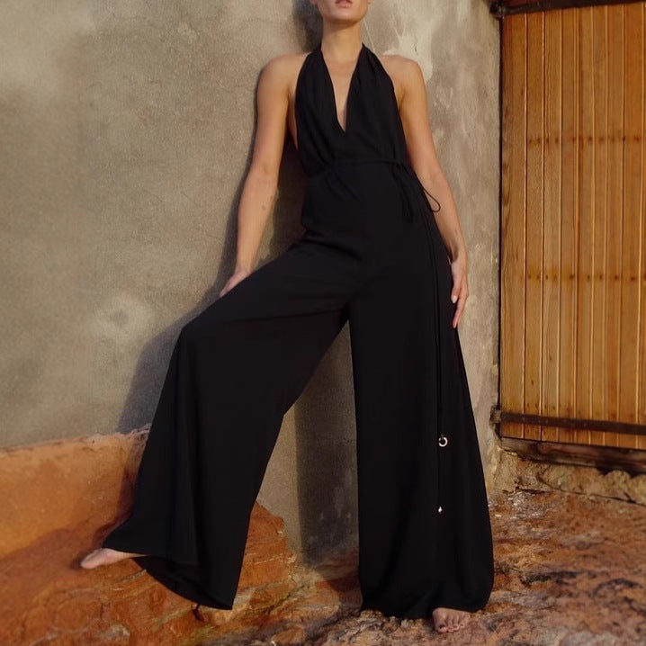 Dame jumpsuit med dyb V-udskæring og bredt ben Stilla