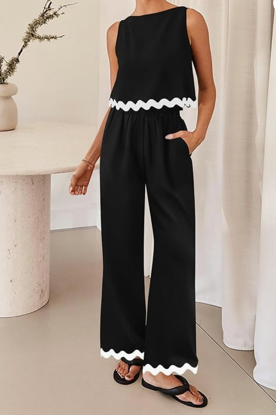 Dame trendy jumpsuit med bred ben og dekorativ bølgekant Stilla
