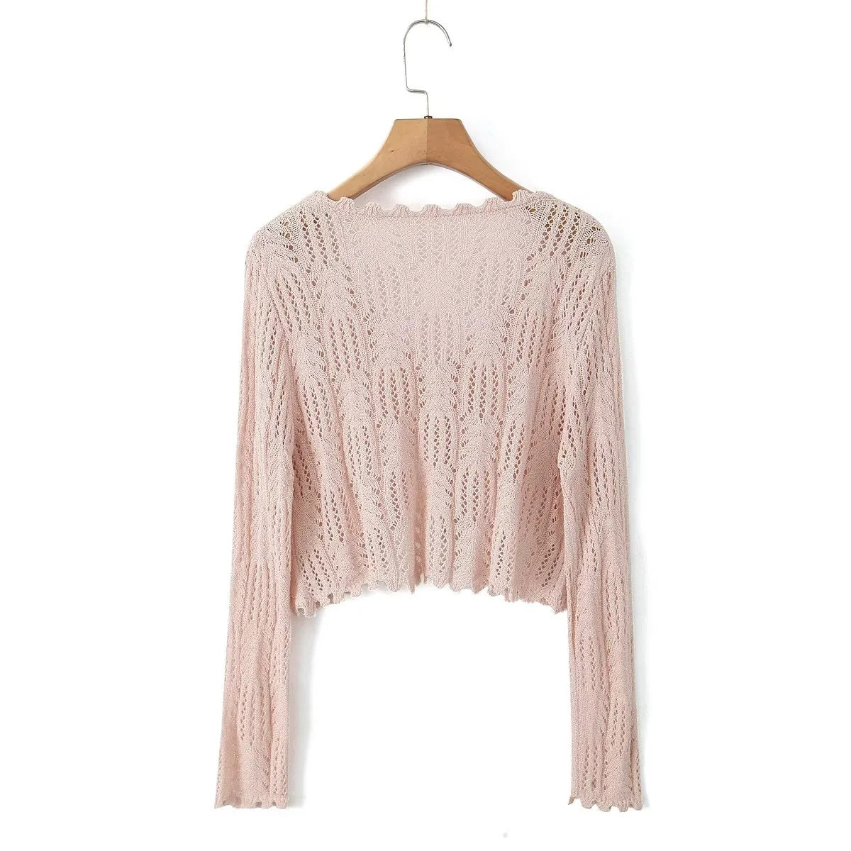 Dame strikcardigan med fint hulmønster og elegante flæsedetaljer Stilla