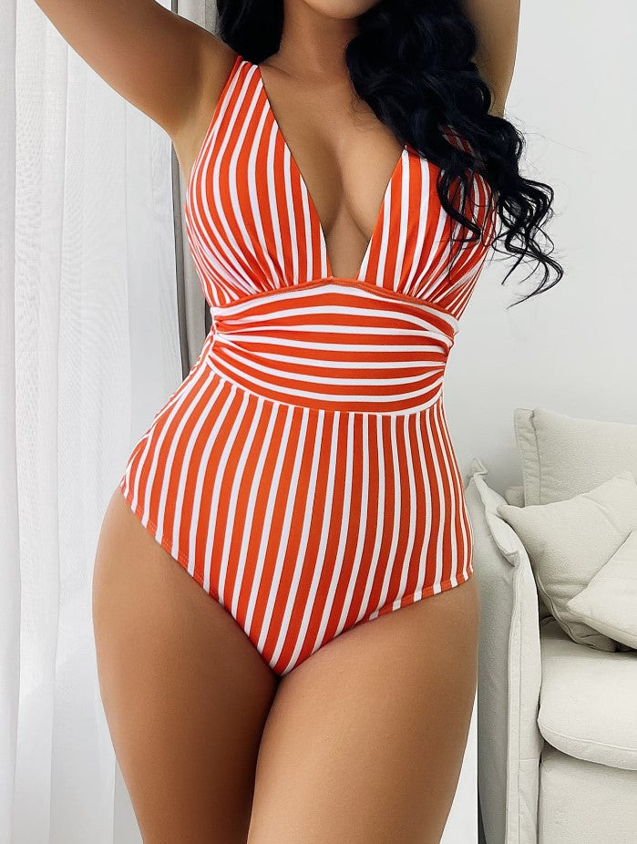 Dame jumpsuit badedragt med elegant V-udskæring og figursyet snit Stilla