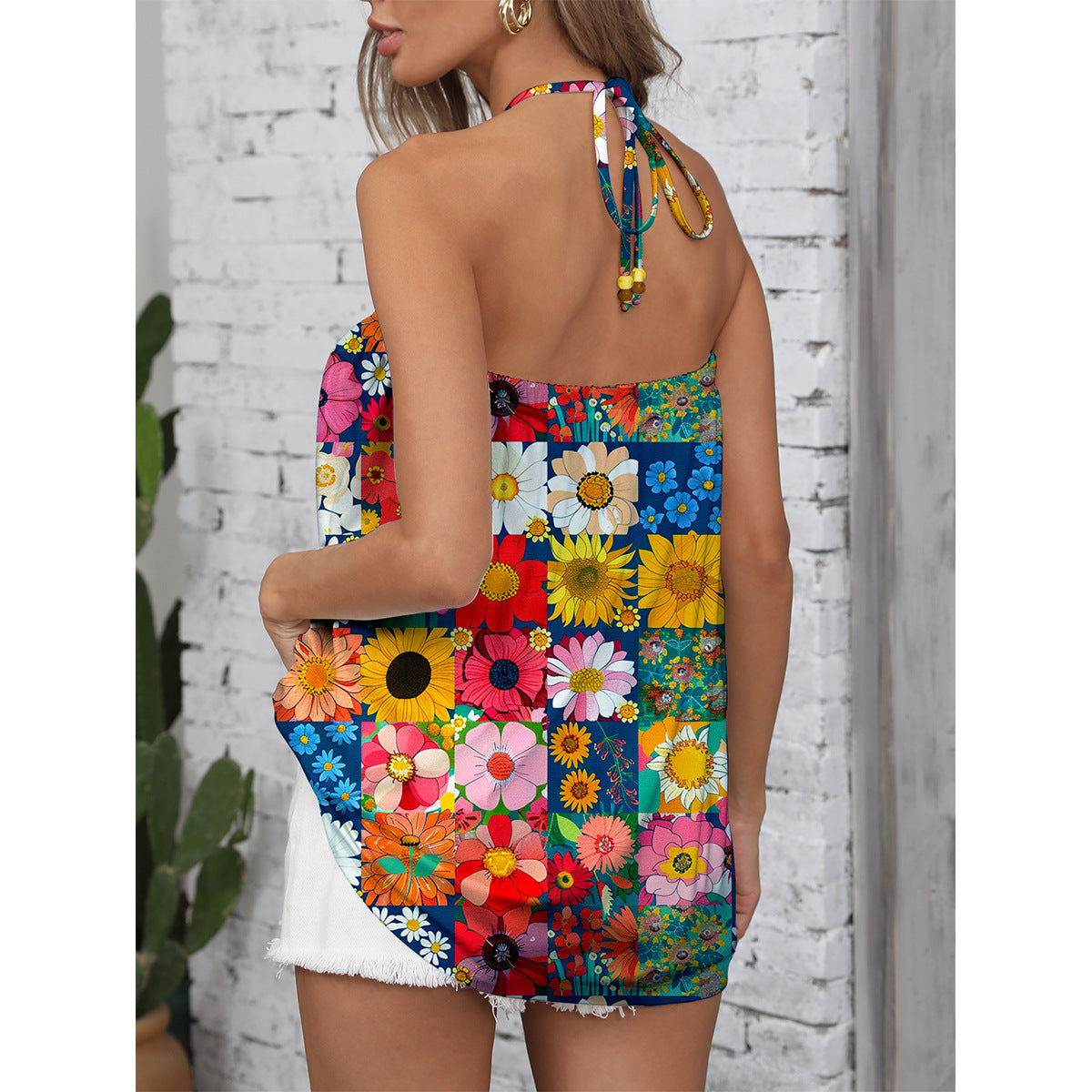 Dame Sommer Jumpsuit med farverigt blomsterdesign og stilfuldt bærerdesign Stilla