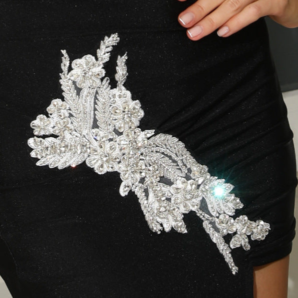 Dame Couture Kjole med asymmetrisk snit og elegante applikationer Stilla