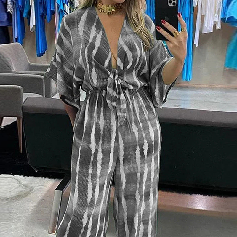 Dame jumpsuit med knyttet talje og bred ben Stilla